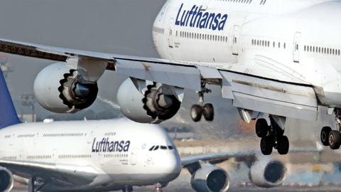 Lufthansa-Flugzeuge am Boden und beim Start